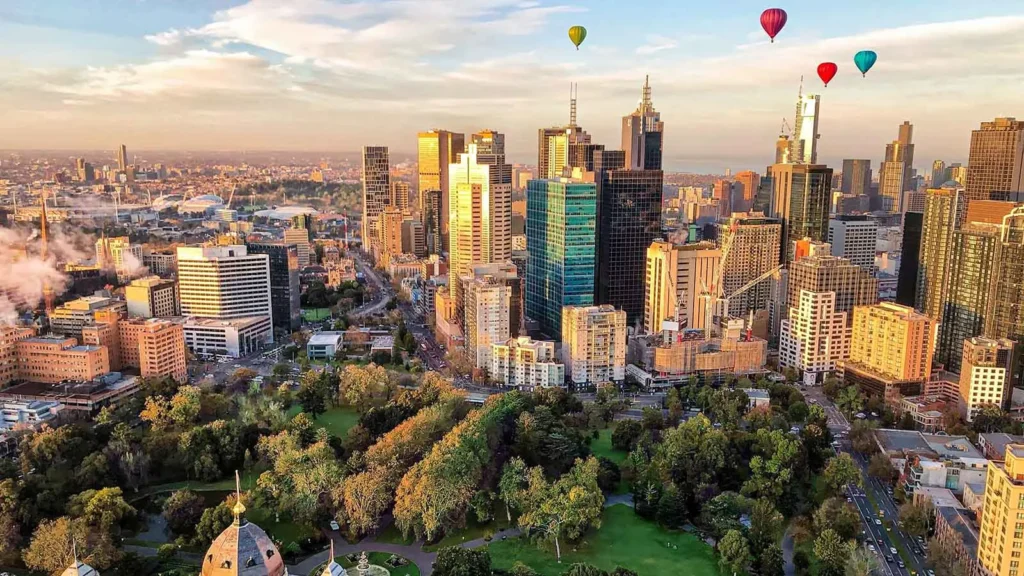 Aerial view of Melbourne city skyline with urban buildings and parklands, representing locations for corporate and community cardiac screening services